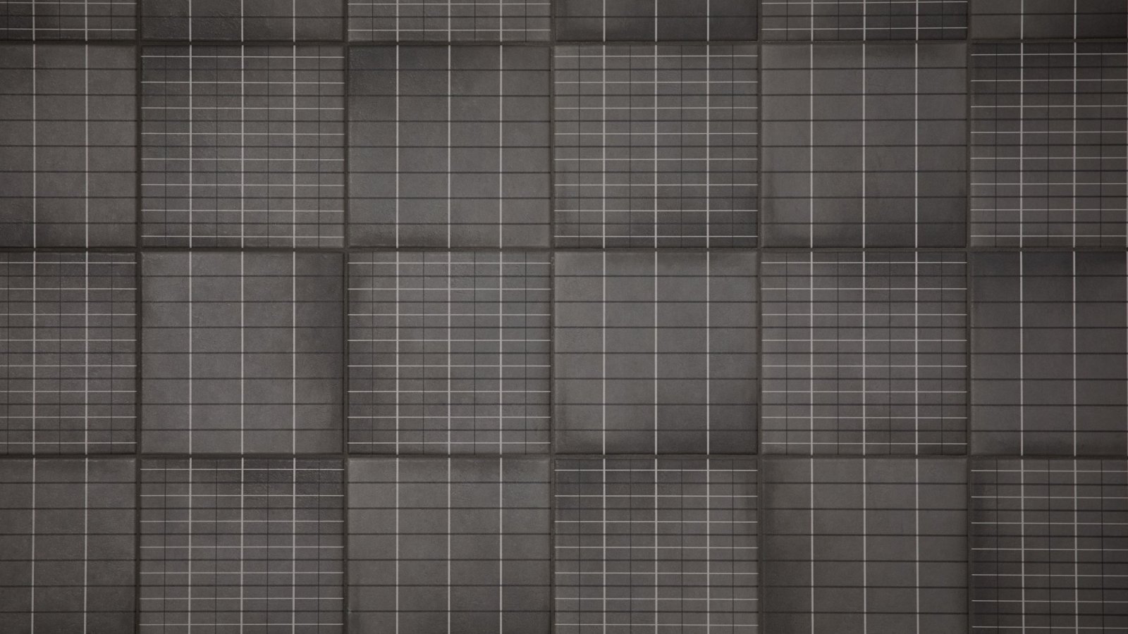 Mutina의 Aurore Charcoal Grid L 타일로 마감한 욕실 벽